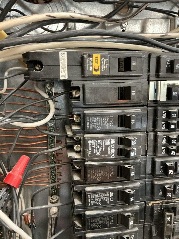 Completed annual 32-point electrical system evaluation including panel maintenance with proper torquing of connections. Performed comprehensive testing of GFCI outlets, Arc Fault breakers, and smoke/CO2 detectors with battery replacement as needed. Visual inspection of the electrical panel revealed properly organized circuit breakers with appropriate wire management and no visible damage or deterioration.