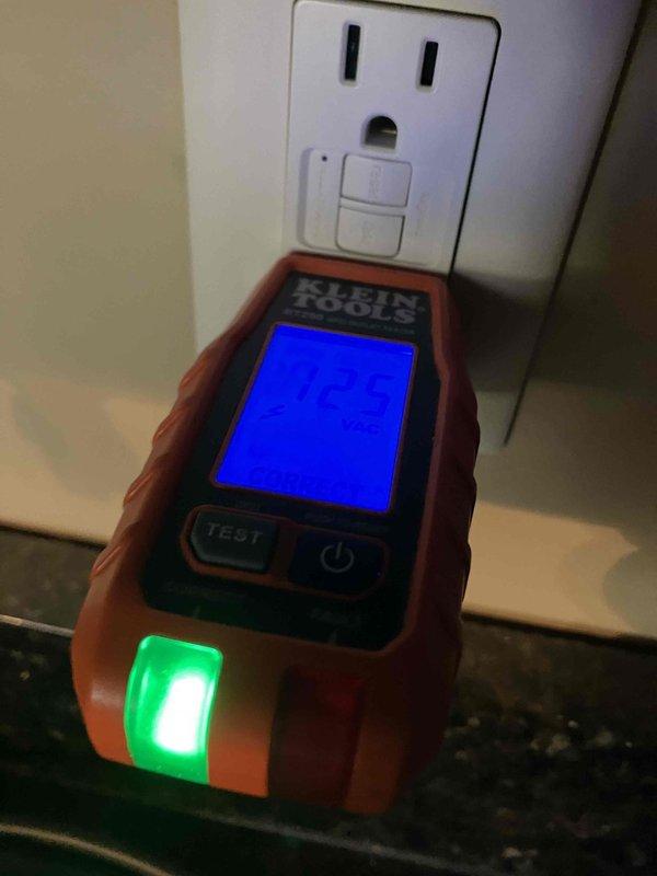 Responded to service call for a tripped GFCI outlet adjacent to a thermostat without power. Diagnostic testing with Klein voltage meter confirmed outlet was tripping immediately upon restoration of power. Replaced faulty GFCI outlet, restoring proper function to both the outlet and power to the thermostat.
