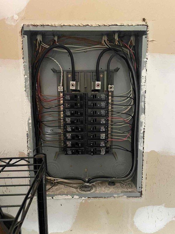 Responded to service call for master bathroom outlet that damaged hair dryer prong. Inspected electrical panel and found signs of corrosion on terminal block with accumulated dust. Replaced damaged outlet and cleaned terminal connections to prevent future overheating issues.