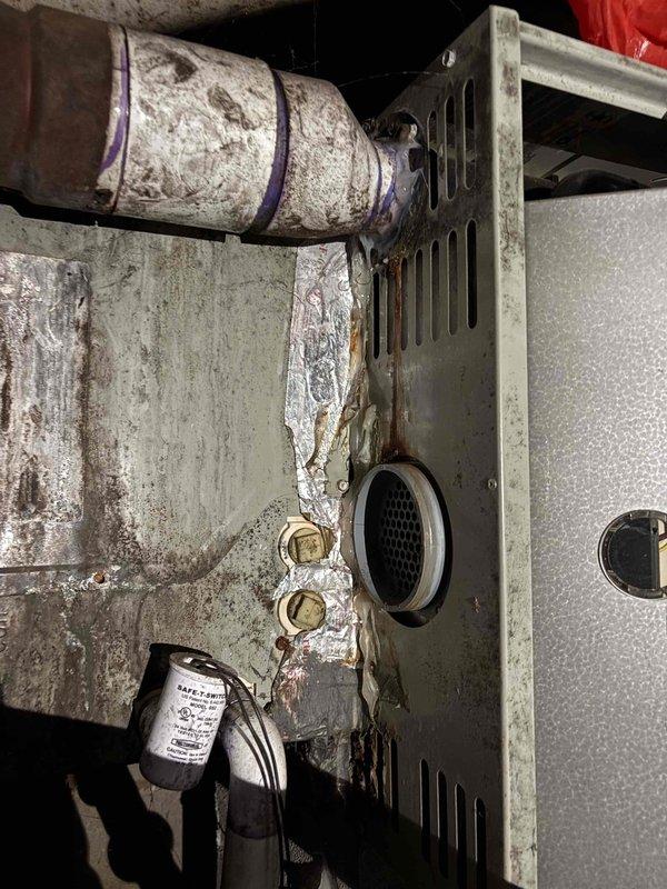 Responded to no-power issue in 2008 upstairs HVAC unit. Inspection revealed severe corrosion and scale buildup on critical components, along with deteriorated CMBIDE control board. Diagnosed electrical failure due to moisture damage and component degradation.