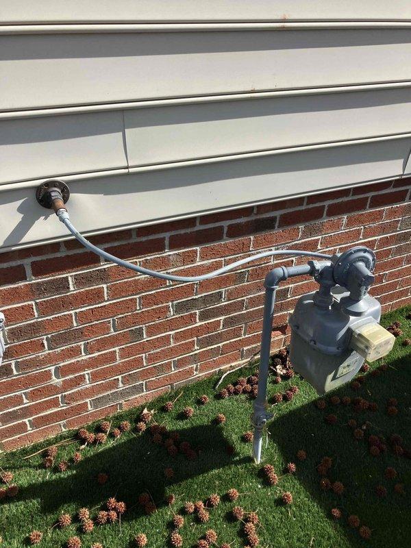 Completed scheduled POM Electrical Visit. Inspection revealed damaged outlet with missing cover plate and deteriorating drywall surrounding the receptacle. Gas meter installation was examined and found to be in normal working condition with proper mounting.