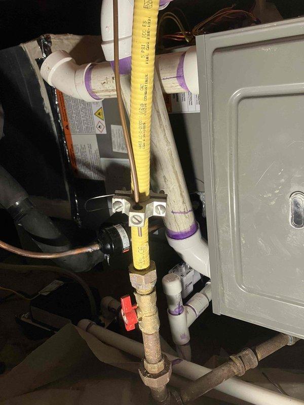Performed third warranty service call on recently installed HVAC unit experiencing intermittent heating failures. Inspection revealed potential gas supply issues with the yellow gas line and associated valve components. Further examination of the control board showed possible electrical concerns with multiple wire connections. Documentation completed with photographs of both the gas line assembly and internal control circuitry for manufacturer review regarding potential recall determination.