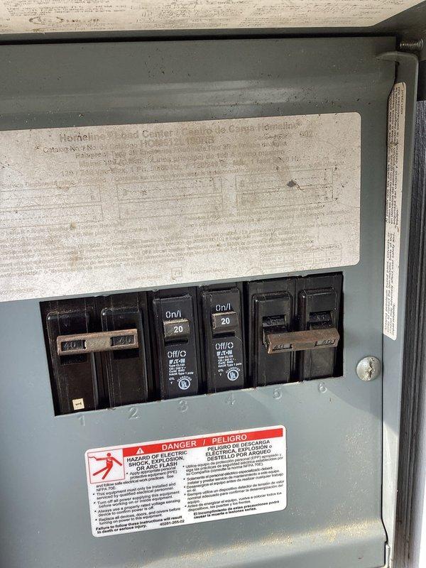 Completed sales consultation for 21-year-old HVAC unit, documenting exterior equipment condition and electrical panel specifications. Discussed 60-month 0% financing options with customer and provided detailed replacement recommendations based on inspection of the aging system. Photos taken of exterior unit placement and electrical service panel for accurate system sizing and installation planning.