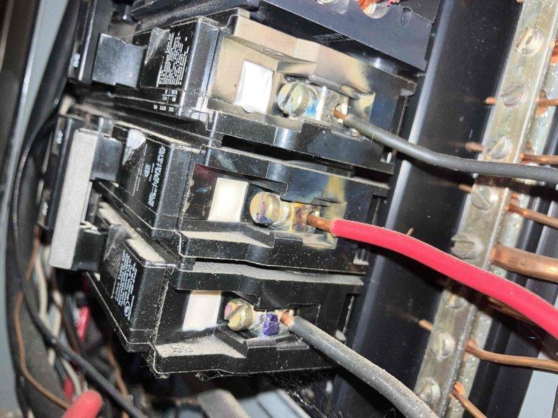 # Service Call Summary

Responded to electrical emergency where homeowner experienced blue arcing when plugging in device in office, resulting in multiple outlets becoming inoperative on the circuit. Breaker had been shut off by customer to prevent further damage.

## Work Performed

Conducted comprehensive electrical inspection of affected office circuit and main electrical panel. Examined panel interior and identified circuit breakers serving the compromised office area. Documented existing electrical panel configuration showing proper wire connections to breakers and bus bars. Inspected main distribution panel with dual rows of circuit breakers, noting copper conduit entry points and wire routing throughout the system. Evaluated all visible electrical connections, terminals, and breaker conditions for signs of damage, overheating, or deterioration related to the arcing event. Photographed panel interior showing breaker arrangement, wire connections, and overall panel condition for s