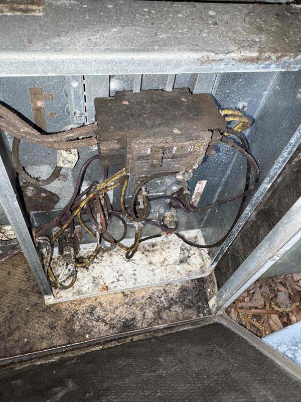Completed tune-up maintenance on 22-year-old heating system and addressed thermostat operation concerns. Upon inspection, discovered severely corroded contactor and transformer assembly with extensive rust deterioration in outdoor electrical enclosure, indicating prolonged moisture exposure and compromised electrical connections. Heat exchanger fins showed moderate dust and debris accumulation requiring cleaning. Verified EcoBee thermostat wiring configuration, as customer reported being instructed by manufacturer to switch to auxiliary heat mode due to heating failures. Given the advanced age of equipment and severe corrosion of primary electrical components, system reliability is significantly compromised and poses potential safety concerns. Documented conditions with photographs for customer review and recommended immediate replacement of corroded electrical components or consideration of full system replacement due to equipment age and deterioration.