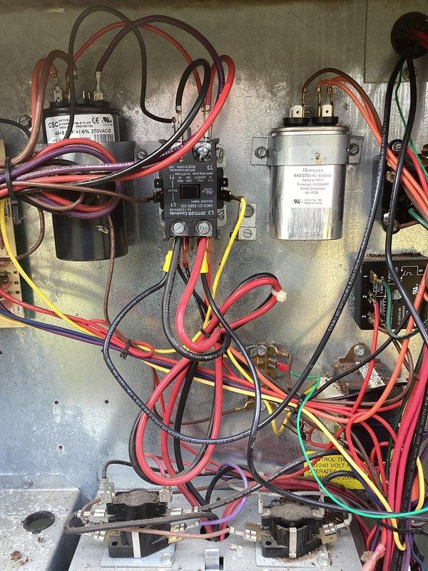 Completed comprehensive heating and air maintenance including 80-point inspection on all units. Performed outdoor coil cleaning, burner cleaning, and adjusted gas pressures to manufacturer specifications. Conducted full safety inspections on all system components. Documented evaporator coil condition showing debris accumulation on fins and verified electrical components including capacitors, contactors, and control wiring. All systems operating within normal parameters with no immediate concerns identified.