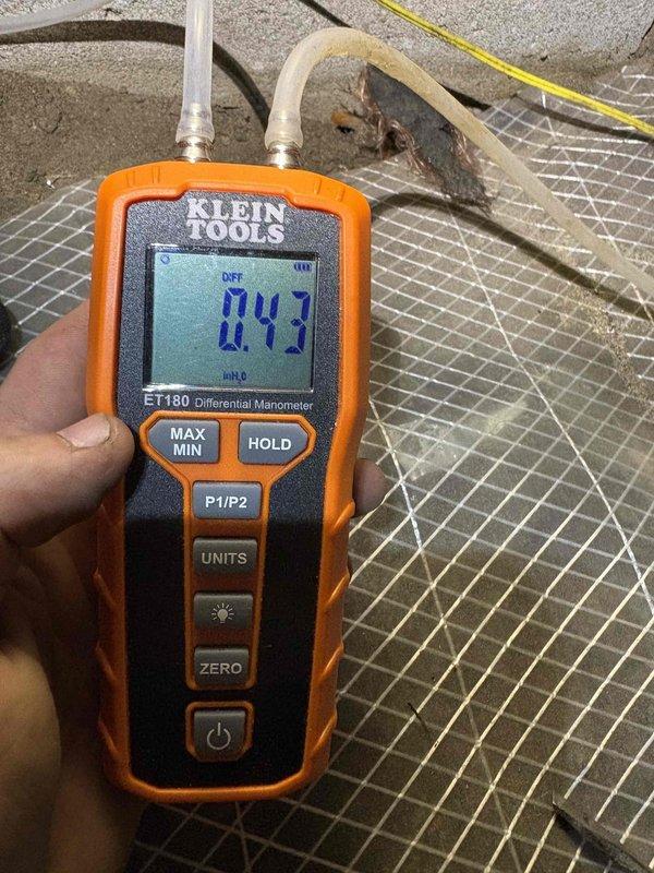 Responded to customer concern regarding thermostat not maintaining set temperatures, with indoor temperatures consistently running 5+ degrees above setpoint. Performed comprehensive system tune-up on 2-year-old single unit HVAC system. Conducted airflow diagnostics using differential manometer, measuring static pressure at 0.43 inches of water column to assess system performance. Inspected thermostat operation, wiring connections, and calibration. Evaluated blower motor operation, refrigerant charge levels, and overall system capacity to identify root cause of inadequate temperature control that had previously been unresolved by multiple service providers.