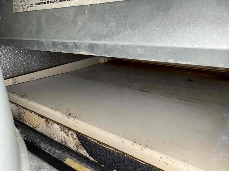 Responded to no cooling complaint on 7-year-old system. Upon inspection, discovered significant debris and nest material obstructing the air handler and return air pathway. Removed obstruction, cleaned affected components, and verified proper airflow restoration. System tested and confirmed delivering proper cooling operation upon departure.