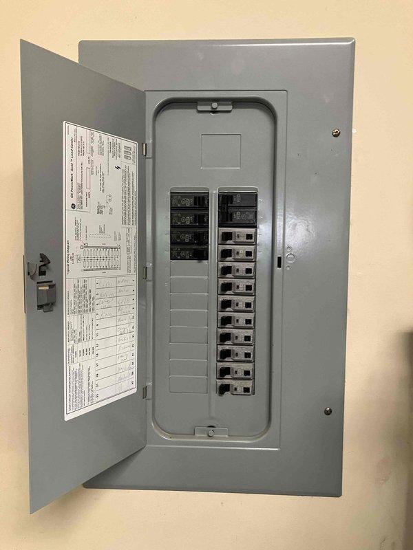 Performed comprehensive whole-home electrical safety evaluation on 2009 residence experiencing nuisance tripping on breakers #8 and #18 under simultaneous load conditions. Conducted thorough inspection of main electrical panel, examining all circuit breakers, wire connections, and grounding systems for signs of overloading, loose connections, or component failure. Documented panel interior conditions including wire routing, breaker arrangement, and overall system integrity through photographic evidence. Evaluated load distribution across circuits and identified potential causes of repetitive tripping on affected breakers, which may indicate undersized circuits, deteriorating breaker contacts, or excessive connected loads exceeding circuit capacity.