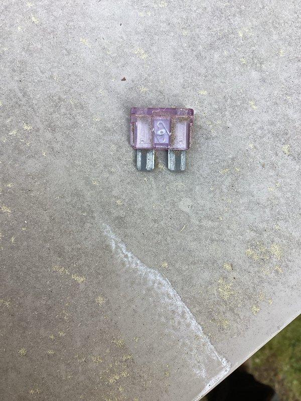 Responded to no cooling call on 11-year-old system where thermostat powered on but no airflow present. Upon inspection, found blown 3-amp fuse at outdoor unit. Replaced defective fuse and restored system to normal operation with proper airflow and cooling confirmed at completion.