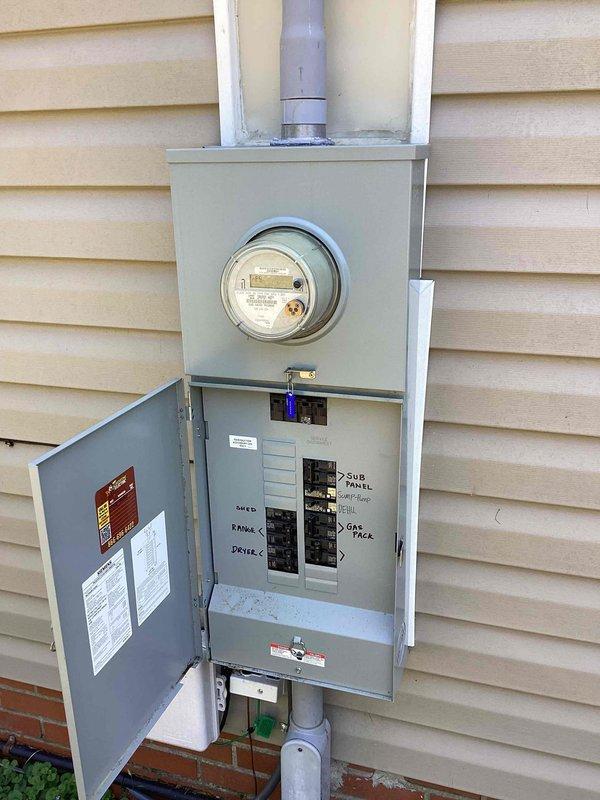 Completed comprehensive 32-point electrical system evaluation on 1950 residence with panel updated in 2020. Performed electrical panel maintenance including torquing all breaker connections and main service connections, verified proper termination of neutral and ground conductors on bus bars, and inspected all circuit breakers for proper operation. Tested all GFCI outlets and breakers for proper ground fault protection, tested AFCI breakers for arc fault detection functionality, and serviced smoke and carbon monoxide detectors including battery replacement and alarm testing. Replaced customer-supplied light bulbs in fixtures up to 12 feet and cleaned ceiling fans up to 12 feet. All electrical components operating within normal parameters, panel connections secure, and safety devices functioning properly.