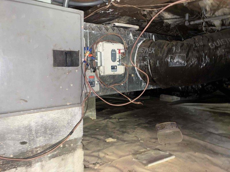 Responded to scheduled appointment for 16-year-old HVAC system with failed compressor. Assessed existing equipment located in crawl space, including air handler, condensate pump, and associated ductwork and refrigerant lines. Documented current system configuration with photographs showing aged unit with deteriorated components, existing flexible ductwork, copper line sets, electrical connections, and crawl space conditions including vapor barrier and concrete foundation. Provided customer with replacement options and recommendations for complete system replacement due to age of equipment and compressor failure.