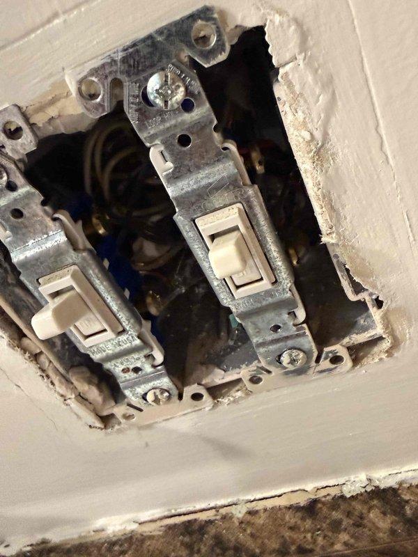Responded to service call for dishwasher with no power in 2007-built home. Performed electrical diagnostic testing and traced circuit from panel to appliance location. Inspected dual switch installation and terminal connections at electrical panel, identifying wiring configuration and circuit integrity. Verified power supply availability to dishwasher circuit and documented existing conditions including wall damage around switch box and terminal block connections. Customer advised that appliance itself would require separate appliance service technician for any internal repairs beyond electrical supply verification.