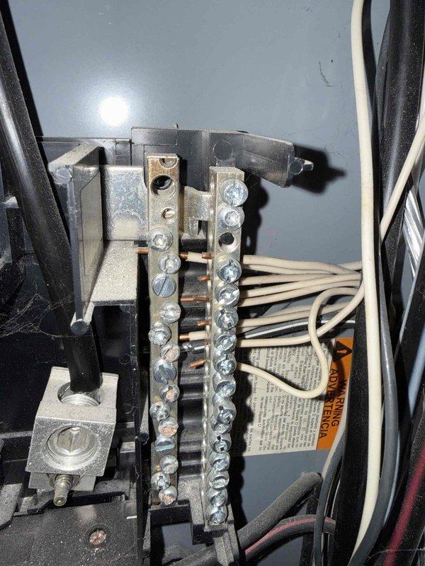 Responded to service call for dishwasher with no power in 2007-built home. Performed electrical diagnostic testing and traced circuit from panel to appliance location. Inspected dual switch installation and terminal connections at electrical panel, identifying wiring configuration and circuit integrity. Verified power supply availability to dishwasher circuit and documented existing conditions including wall damage around switch box and terminal block connections. Customer advised that appliance itself would require separate appliance service technician for any internal repairs beyond electrical supply verification.