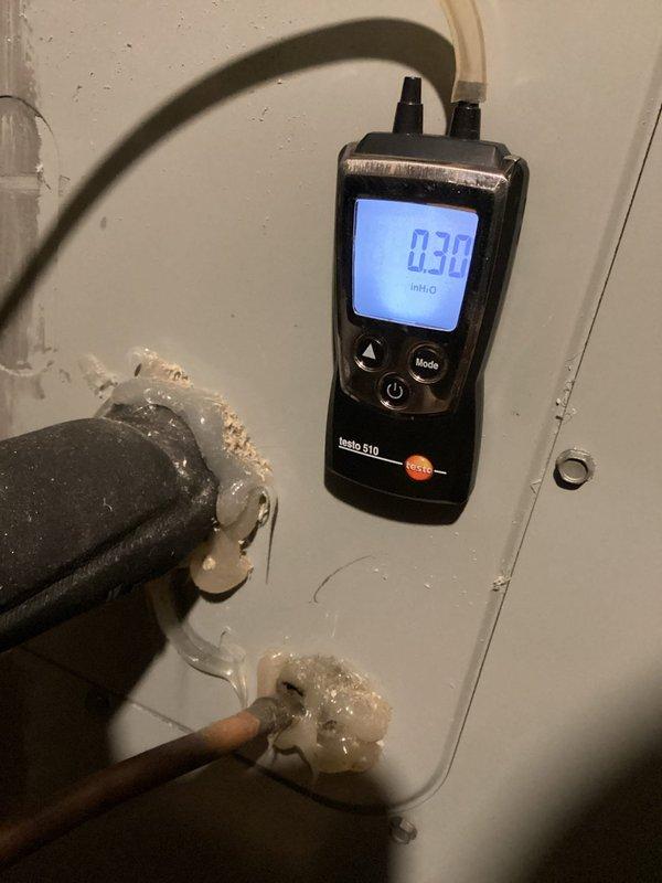 Completed comprehensive heating and air maintenance on 2017 HVAC system including full 80-point inspection on all units. Performed outdoor coil cleaning, burner cleaning, and verified gas pressures with adjustments as needed. Measured differential pressure at 0.30 inches of water column, inspected refrigerant lines showing proper operation with normal frost accumulation, and conducted thorough safety inspection of electrical components and control cabinet wiring.