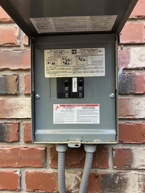 Responded to service call for two GFCI outlets experiencing issues in 2007-built residence. Bathroom GFCI outlet tripped once and lost all power with no ability to reset. Kitchen GFCI outlet displayed red indicator light instead of normal yellow status light after reset attempt, though outlet continued providing power to connected devices. Inspected both GFCI receptacles and verified no new electrical loads or equipment had been added to circuits. Evaluated electrical panel and circuit breaker connections serving affected GFCI outlets. Documented panel configuration and breaker positions for affected circuits. Tested GFCI functionality and circuit integrity at both locations to determine root cause of failures and restore proper operation.