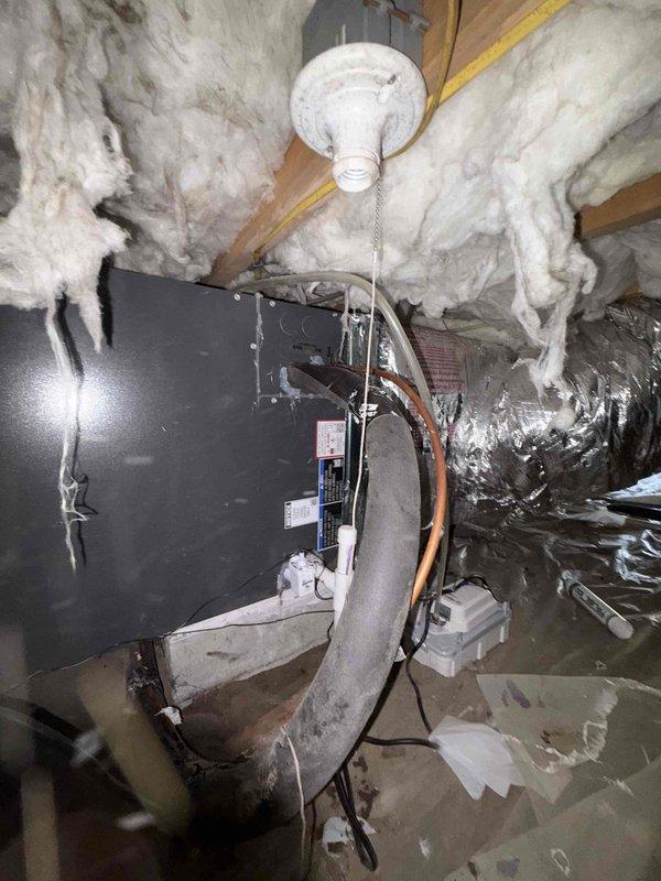 Completed HVAC system installation in attic space, including new air handler unit with associated ductwork, electrical connections, and refrigerant lines. Customer provided down payment via check, with remaining balance to be paid by check or credit card upon project completion.