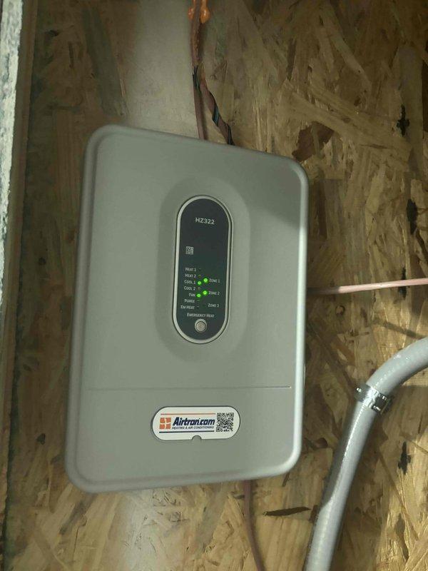 Completed comprehensive heating and air maintenance on single-unit new construction system. Performed 80-point inspection covering all major components and operational parameters. Cleaned outdoor condenser coils using professional coil cleaner solution to remove debris and restore optimal heat transfer efficiency. Conducted burner cleaning and adjusted gas pressures to manufacturer specifications. Verified proper operation of Carrier outdoor unit and Aatroncom zone control system. Completed all safety inspections with system operating within normal parameters.