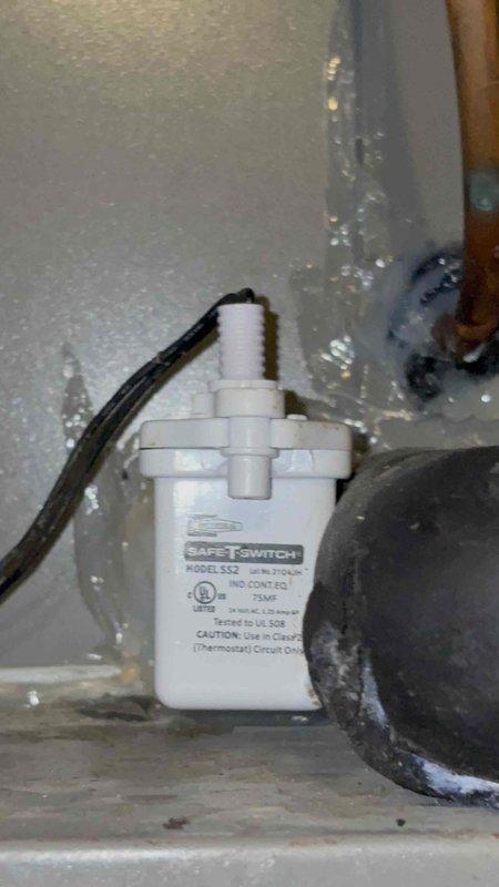 Completed comprehensive heating and air maintenance on single-unit system including 80-point inspection, outdoor coil cleaning, burner cleaning, and gas pressure adjustments. Verified all electrical connections and high-voltage components within cabinet are secure and functioning properly. Inspected Safe-T-Switch condensate overflow safety device and confirmed proper operation with no active drainage issues or blockages present.