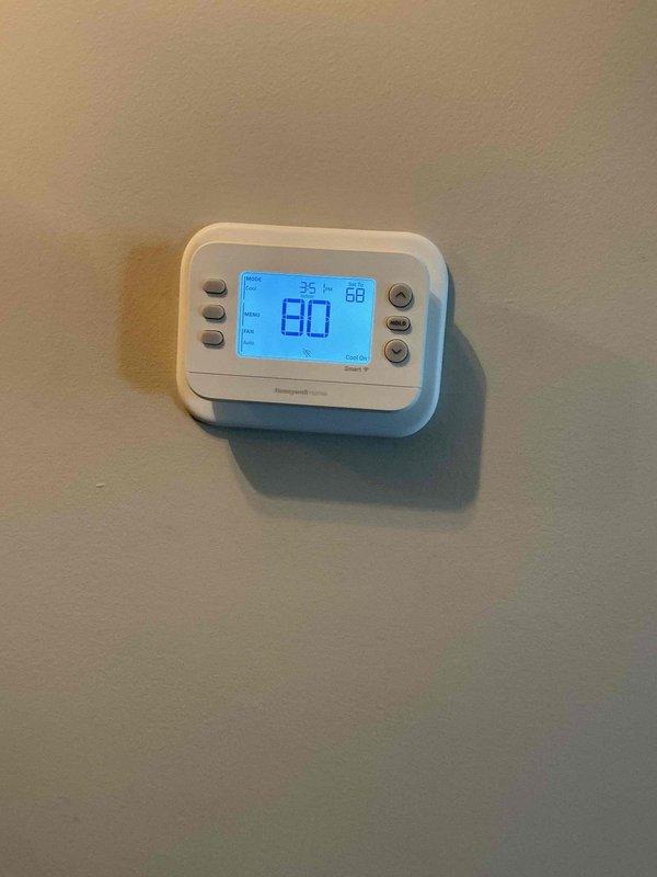 Completed HVAC system installation including thermostat and carbon monoxide detector setup. Installed and programmed Honeywell digital thermostat with proper temperature calibration and configured Kidde plug-in carbon monoxide detector to ensure optimal safety monitoring throughout the residence.