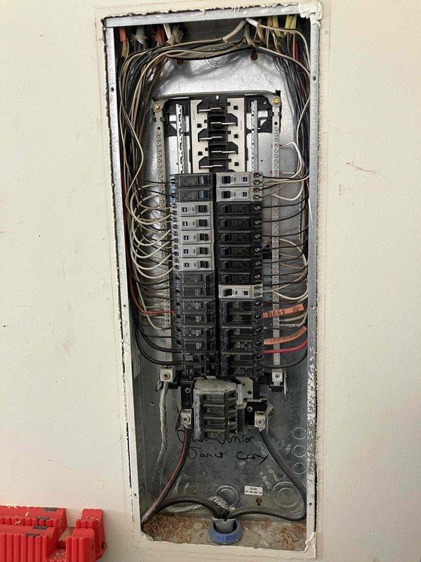 Installed a dedicated 240-volt circuit from the garage electrical panel to the living room wall to accommodate a new window air conditioning unit. Ran new wiring through crawl space with sheetrock access required for proper installation, and upgraded the existing outlet to a 240V receptacle to ensure safe operation of the equipment. All work completed to code with proper circuit protection installed at the main panel.
