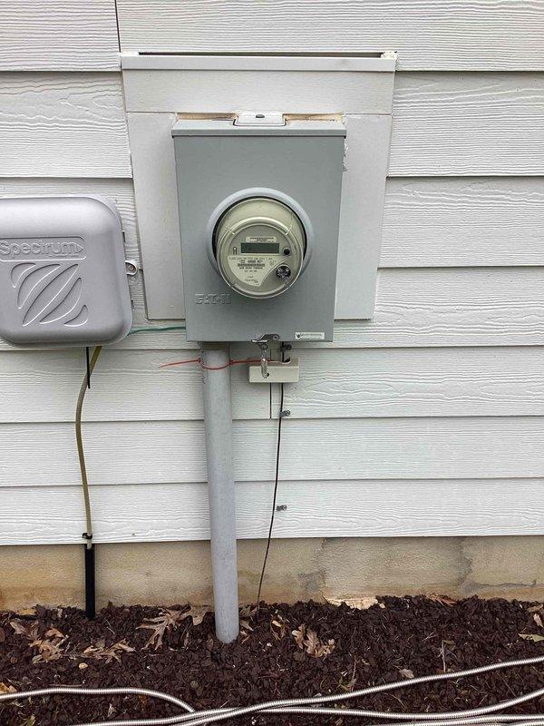 Completed comprehensive 32-point annual electrical system evaluation on residential property. Performed electrical panel maintenance including torque verification and connection inspection of all circuit breakers and bus bars. Conducted GFCI outlet and breaker testing throughout the residence to verify proper ground fault protection and trip functionality. Tested all AFCI breakers to ensure fire protection circuits were operating within specifications. Performed smoke detector and carbon monoxide detector maintenance including battery replacement and functional testing of all units. Replaced customer-supplied light bulbs in fixtures up to 12 feet and cleaned ceiling fans up to 12 feet. Inspected exterior meter installation and verified proper mounting and weatherproofing of service entrance equipment. Documented electrical panel configuration with digital monitoring device showing normal operating parameters. All safety devices tested and confirmed operational. System found to be funct