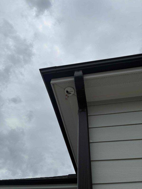 Installed new Ring floodlight camera at exterior corner of home approximately 12-14 feet high, making necessary electrical connections to existing wiring where previous fixture was removed. Hardwired doorbell system, completing all required electrical connections and mounting to ensure proper operation of both devices.