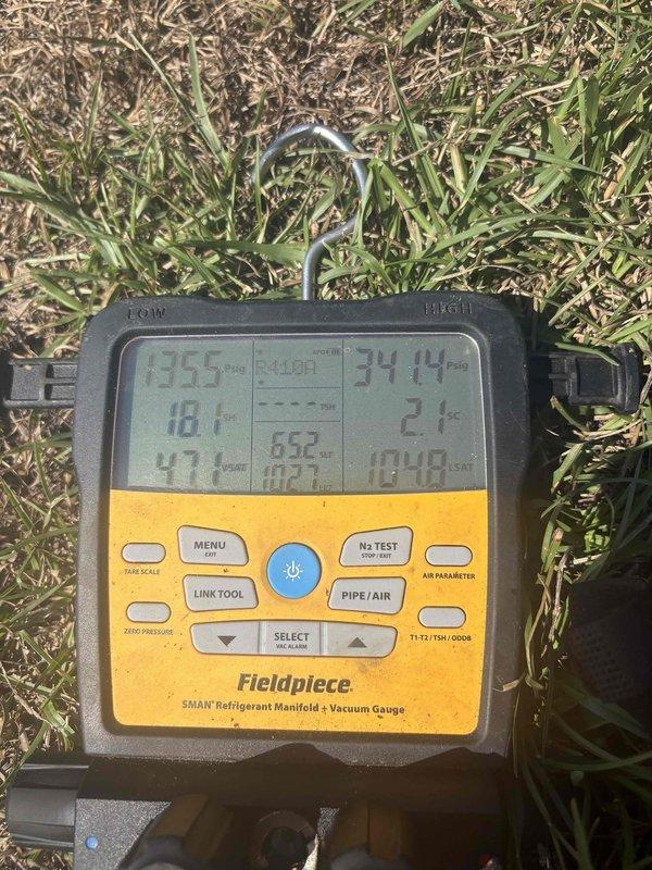 Responded to no-cool complaint on 10-year-old R-410A heat pump system. Found overflow drain pan full, triggering safety float switch and preventing system operation. Cleared condensate line blockage, verified proper drainage, and tested system refrigerant pressures with manifold gauges to confirm unit returned to normal cooling operation.