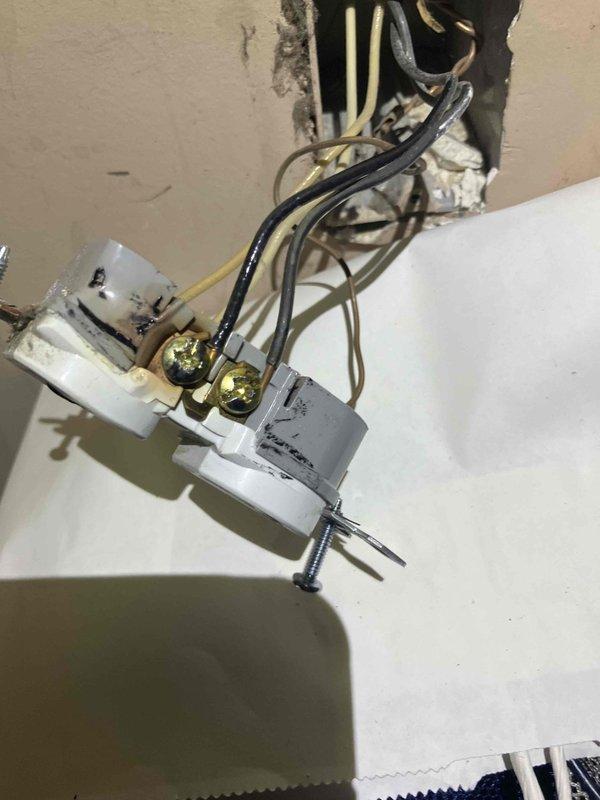 Responded to no power issue in bedroom while bathroom remained energized. Upon investigation, discovered loose connection at ceiling fixture with multiple conductors showing signs of high resistance. Infrared temperature scan confirmed elevated temperature reading of 122°F at affected connection point, indicating poor contact causing voltage drop. Secured all wire terminations at fixture, verified proper torque on terminal screws, and restored power to bedroom circuit. Confirmed all outlets and fixtures operational upon completion.