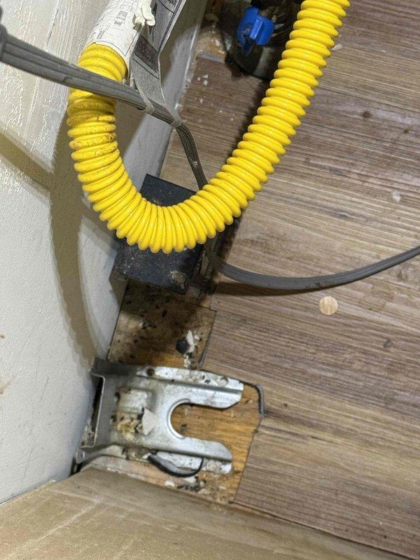 Responded to service request for oven outlet installation at residential property built in 2000. Upon arrival after 3pm as scheduled, assessed electrical service entrance and existing exterior wiring configuration. Installed dedicated electrical outlet circuit for oven application, running new conduit from exterior junction box to interior location. Verified proper grounding, tested circuit integrity, and confirmed installation meets code requirements for major appliance connection.