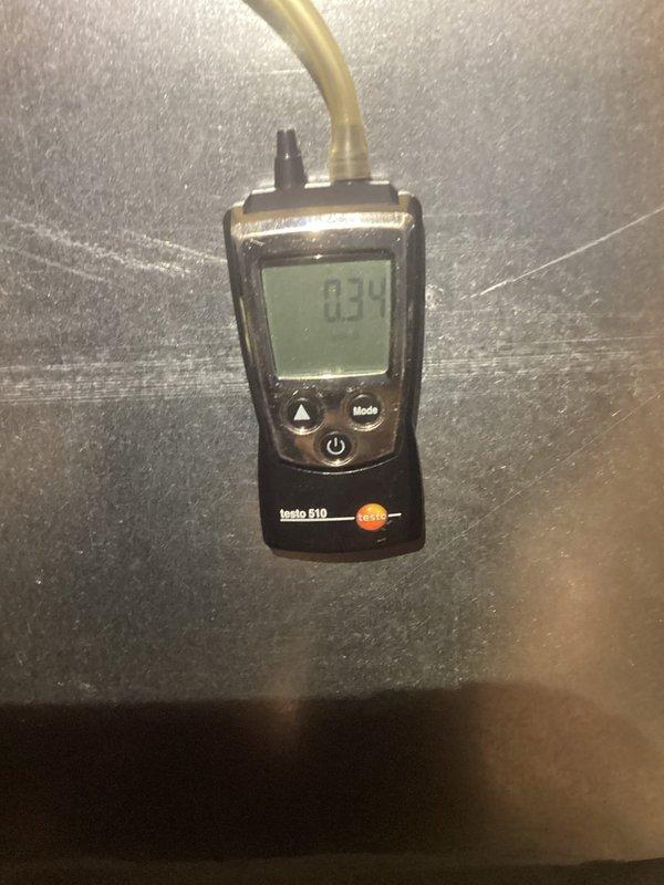 Completed comprehensive tune-up on 4-year-old HVAC system including standard maintenance procedures and diagnostics. Vacuumed condensate drain pan to address recurring shutdown issue caused by water accumulation, ensuring proper drainage and preventing future safety switch activations. Measured system pressures with digital manometer reading 03 and verified electrical draw at 45.30 amps using clamp meter, confirming unit is operating within normal parameters.