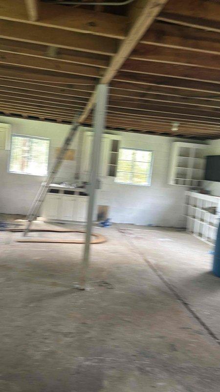 Conducted sales consultation for newly purchased brick building requiring HVAC installation. Assessed unfinished interior space with exposed ceiling beams, concrete flooring, and existing electrical panel to determine heating and cooling system requirements. Provided recommendations for complete HVAC unit installation to condition the permitted structure.