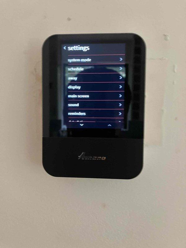 Responded to no cooling complaint on recently installed Amana air handler system with error code displayed on thermostat. Upon arrival, found unit in error state with indoor temperature reading 79°F and 62% humidity. Investigated air handler malfunction, accessed system diagnostics through Amana touchscreen thermostat, and identified potential recall-related component issue affecting unit operation. Documented system settings and current operating conditions for warranty and recall verification purposes.