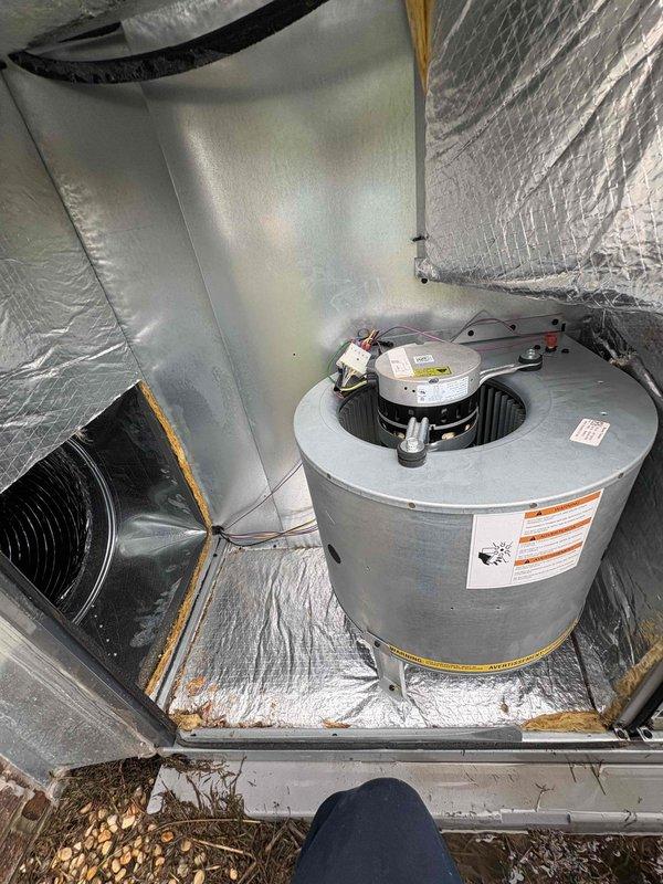 Completed comprehensive heating and air maintenance on single-system installation including full 80-point inspection, outdoor coil cleaning, burner cleaning, gas pressure adjustment, and safety inspections. Accessed attic-mounted air handler unit, verified blower motor assembly operation, and confirmed all electrical connections secure with proper insulation intact. All components operating within normal parameters with no deficiencies noted.