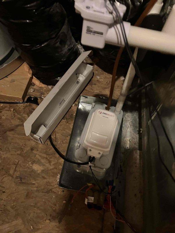 Responded to no power condition in upstairs den and attic space of 2011 home. Investigated electrical issue affecting HVAC unit located in attic, which was also experiencing AC failure. Inspected electrical panel and confirmed no tripped breakers, then traced circuits to affected areas. Examined attic HVAC installation including condensate pump, ductwork, and associated wiring to identify power loss. Troubleshot electrical connections and components to restore power to affected circuits and resolve loss of cooling.