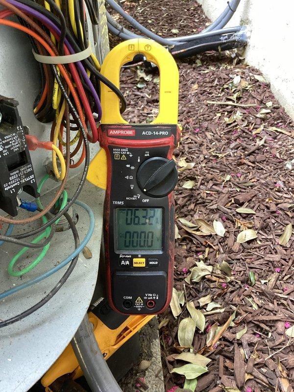 Responded to no cooling complaint on second level of residence with two-system setup. Upon inspection, verified airflow at return air vent and performed electrical diagnostics on outdoor unit using clamp meter to measure amperage draw and verify proper compressor operation. System demonstrated adequate cooling capacity during evening hours but struggled to maintain temperature below 80 degrees during peak heat conditions, consistent with unit operating at design limitations during extreme ambient temperatures.