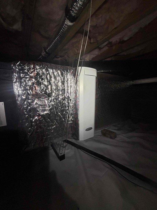 Responded to no cooling complaint on downstairs air conditioning system in a two-system residential property. Upon inspection of the air handler unit located in the basement, diagnosed failed capacitor preventing blower motor operation. Replaced defective capacitor, verified proper electrical connections, and tested system operation. Unit restored to normal cooling function with proper airflow confirmed.