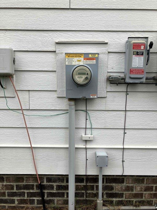 Responded to service call for non-functioning doorbell system after homeowner removed Ring doorbell and reinstalled traditional doorbell. Inspected interior doorbell chime location and exterior electrical service panel to verify transformer operation and circuit integrity. Documented existing electrical service configuration including meter box, disconnect panel, and associated conduit runs to assess power supply for low-voltage doorbell transformer in preparation for upcoming security system installation.