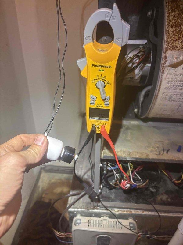 Responded to service call for air conditioning unit experiencing significant water leakage onto floor. Upon arrival, confirmed unit had been shut down by occupant to prevent further water damage. Performed diagnostic testing of electrical components and system operation using clamp meter to verify proper functionality. Inspected internal components, filter compartments, and drain system to identify source of water leak and assessed overall system condition of 11-year-old unit.