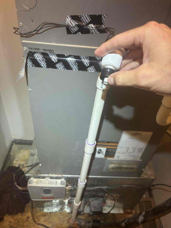 Responded to service call for air conditioning unit experiencing significant water leakage onto floor. Upon arrival, confirmed unit had been shut down by occupant to prevent further water damage. Performed diagnostic testing of electrical components and system operation using clamp meter to verify proper functionality. Inspected internal components, filter compartments, and drain system to identify source of water leak and assessed overall system condition of 11-year-old unit.