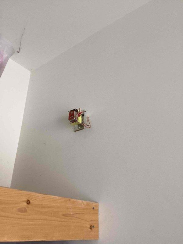 Responded to service call for doorbell malfunctioning and ringing intermittently on its own. Inspected existing doorbell transformer mounted on interior wall and assessed wiring connections. Replaced faulty doorbell system including transformer to resolve the issue and verified proper operation upon completion.