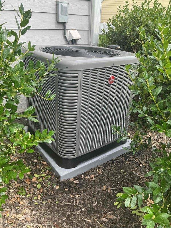Completed full HVAC system replacement including removal of existing equipment and installation of a Rheem 3-ton, 14.3 SEER2 heat pump system (Model RP14AY36AJ2NA) with matching 2-stage multipoise air handler (Model RH2TY3617STANNJ) utilizing R-454B refrigerant. Installed new outdoor condenser pad and positioned unit on exterior of residence with proper clearances for airflow and serviceability. Mounted air handler in attic space with N-coil configuration and constant torque motor for improved efficiency and comfort control.

Added Tutco 8kW heat kit without breaker for supplemental heating capacity during extreme cold conditions. Integrated 2-stage zone board to enable multi-zone temperature control throughout the residence. Installed two Honeywell FocusPRO P200 programmable thermostats (Model TH2320U4006/U) configured for 3 heat/2 cool operation to provide independent climate control for separate zones.

Installed float switches on air handler drain pan to prevent water damage from p