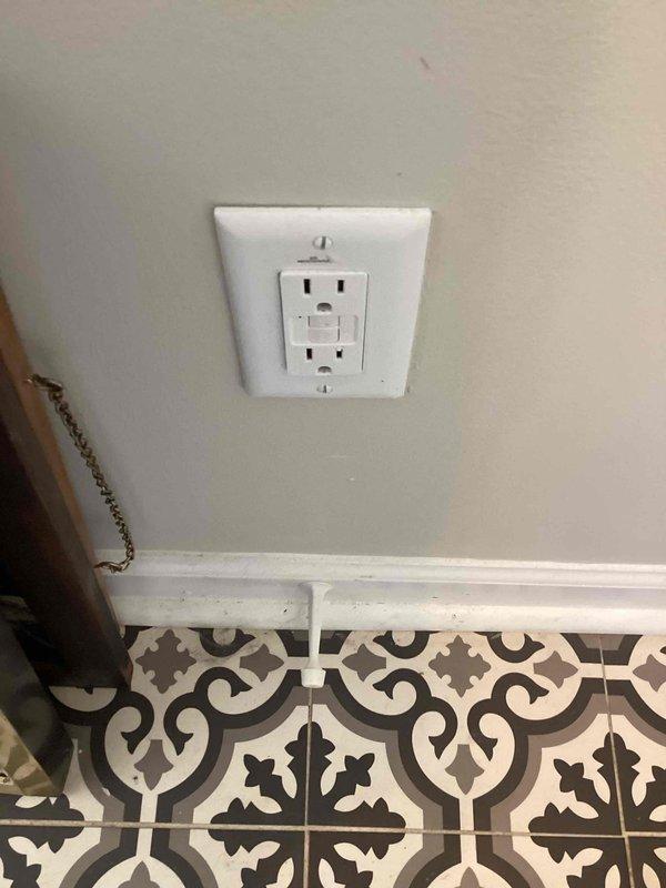 Responded to non-functioning exterior GFCI outlet that lost power after potential water exposure from rain while cord was plugged in. Tested exterior outlet with Klein RT250 GFCI tester and confirmed no power; verified main breaker was not tripped. Located and tested upstream interior GFCI outlet which had tripped, successfully reset the device, restoring power to the exterior outlet and confirming proper GFCI protection throughout the circuit.