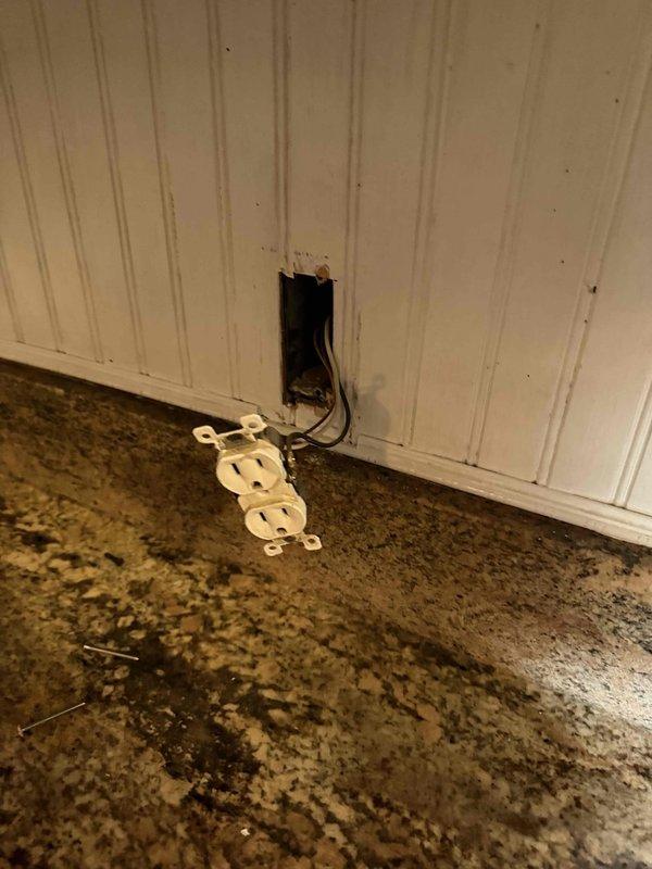 Responded to service call for non-functioning refrigerator suspected to be caused by electrical issue. Upon inspection, discovered faulty kitchen counter outlet receptacle that was providing power to the refrigerator. Removed defective outlet from wall box, inspected wiring connections and electrical box for damage, and replaced receptacle with new duplex outlet to restore power. Verified proper circuit operation and confirmed refrigerator returned to normal function.