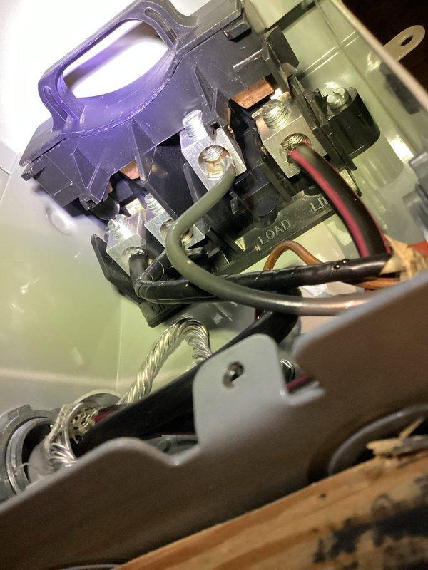 Responded to no-cool complaint on upstairs system experiencing extended runtime and poor cooling performance. Upon diagnostic evaluation, tested capacitor using clamp meter which displayed 50.10 μF reading, indicating capacitor failure below manufacturer specifications. Inspected contactor assembly and electrical connections for proper operation. System was running but unable to maintain temperature setpoint due to compromised capacitor affecting compressor efficiency.