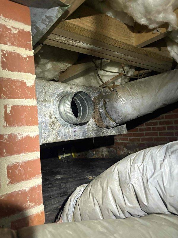 # HVAC System Temperature Differential Investigation

Responded to cooling system concern regarding temperature readings significantly below setpoint compared to multiple reference thermometers throughout the home. Performed comprehensive system inspection including attic and crawl space areas to assess HVAC ductwork, airflow distribution, and system operation. Documented existing ductwork configuration including 12-inch diameter flexible ducts, structural mounting, and installation conditions. Inspected accessible ductwork connections, insulation integrity, and potential air leakage points that could affect temperature consistency and system performance throughout the living spaces.