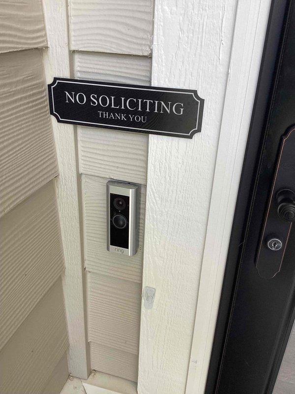 Installed customer-supplied Ring video doorbell at front entrance, mounting the device to existing door frame trim and connecting to electrical wiring at terminal block. Verified proper operation of doorbell camera, button functionality, and power supply upon completion.