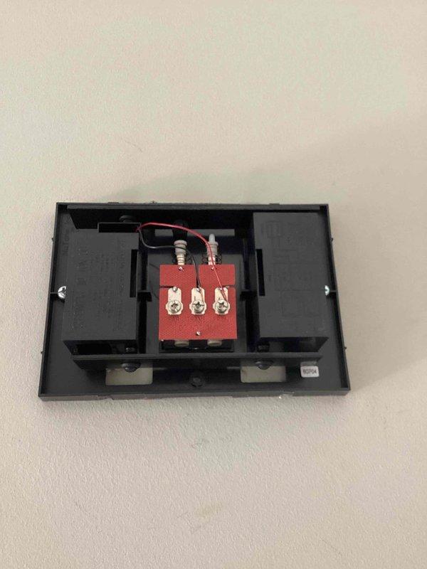 Installed customer-supplied Ring video doorbell at front entrance, mounting the device to existing door frame trim and connecting to electrical wiring at terminal block. Verified proper operation of doorbell camera, button functionality, and power supply upon completion.