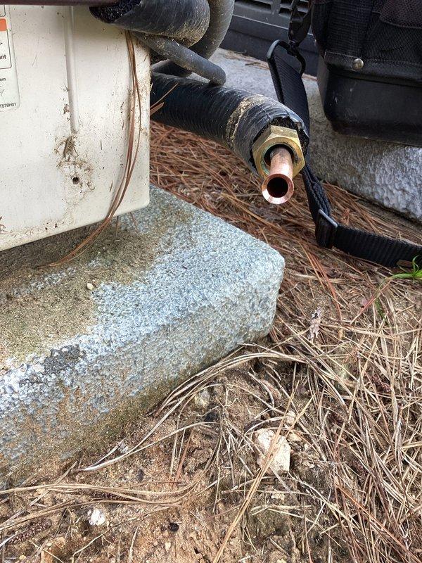 Completed leak repair on HVAC system under preventive maintenance agreement, requiring approximately 5 hours of labor. Addressed refrigerant line insulation deterioration at outdoor unit where black wrapping material had degraded, exposing copper piping and creating potential for condensation issues and energy loss. Inspected electrical panel connections and circuit breakers serving the HVAC equipment to ensure proper power supply and safety compliance during repair process.