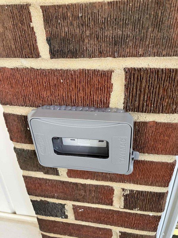 Responded to tripped GFCI outlet on front porch that failed to reset after moisture intrusion from misting activity. Diagnosed and replaced faulty GFCI receptacle in weatherproof exterior box mounted on brick wall, restoring power to protected circuit. Additionally, removed existing ceiling fan with broken pull chain in bedroom and installed customer-supplied replacement ceiling fan unit with remote control operation at standard ceiling height, completing all electrical connections and verifying proper functionality.
